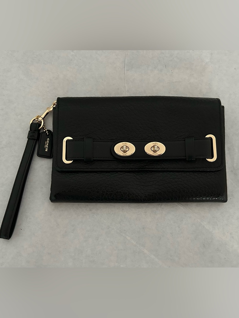 Coach Black Leather Wristlet Clutch with Gold-Tone Accents
